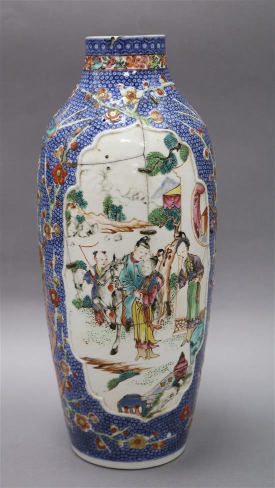 An 18th century Chinese export vase with panels of figures height 29cm